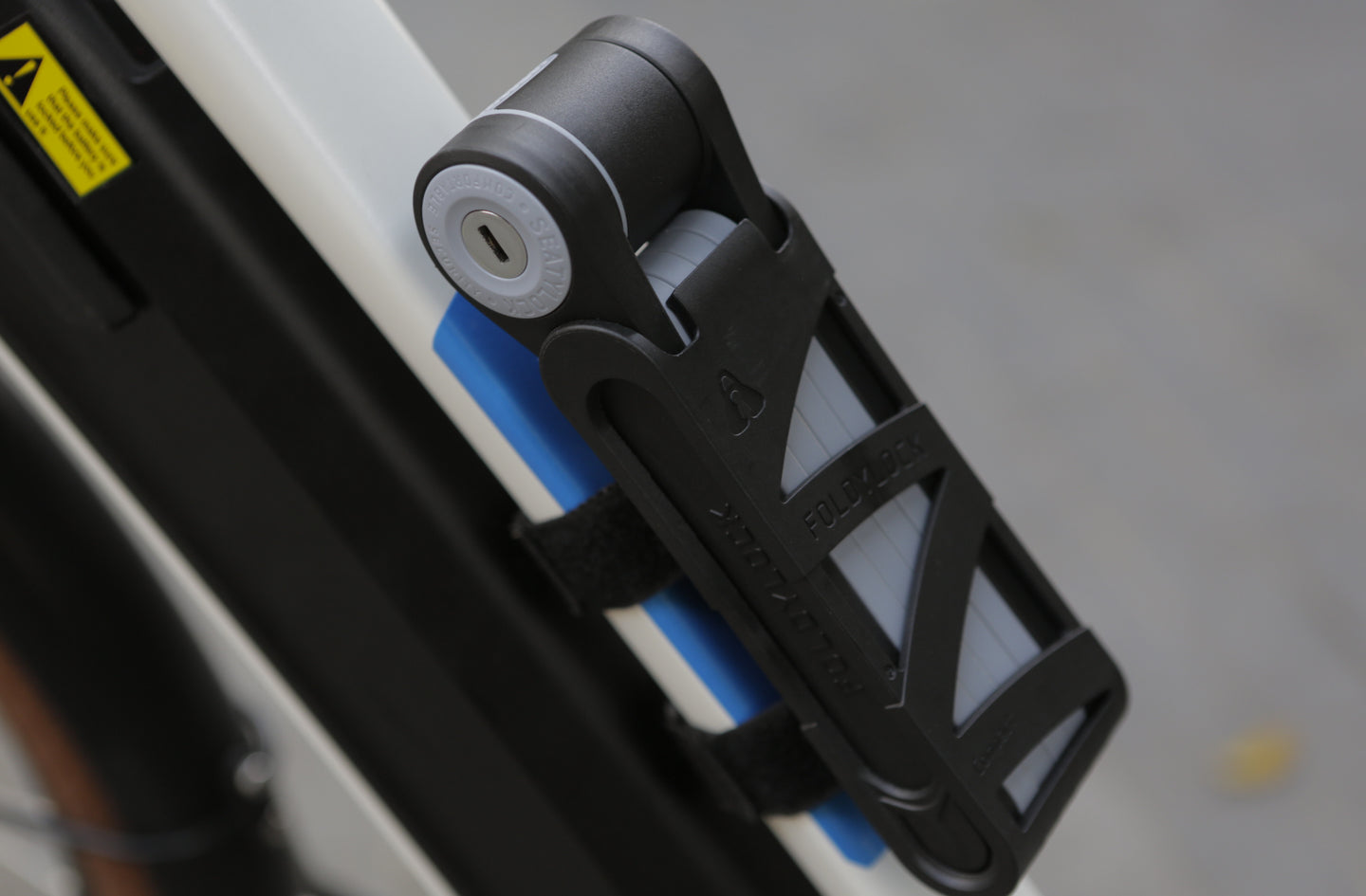 Folding Bike Lock Mounting: Bottle-Cage Bosses, Straps and Rattle-Free Carry