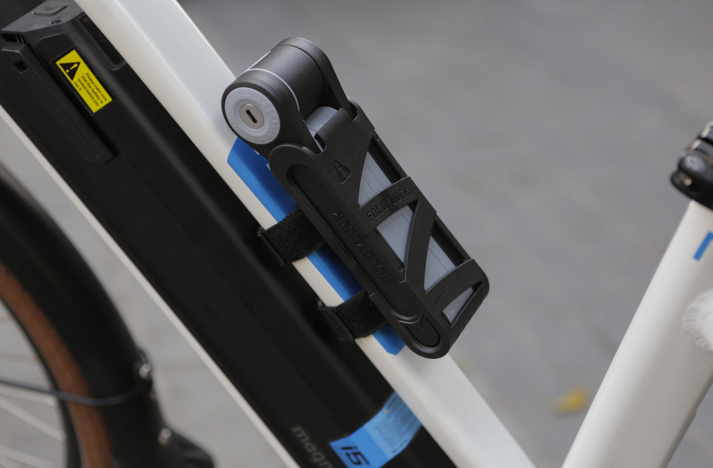 Folding Bike Lock Mounting: Bottle-Cage Bosses, Straps and Rattle-Free Carry
